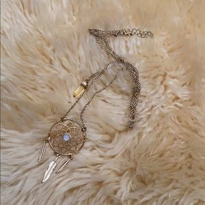 Gold dream catcher and glass stone